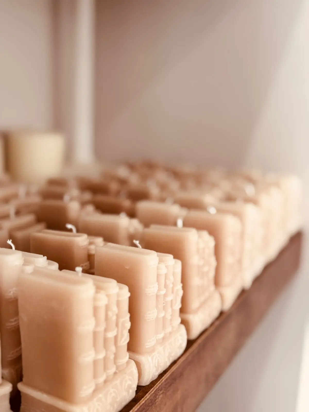 Candles of mini books next to each other.