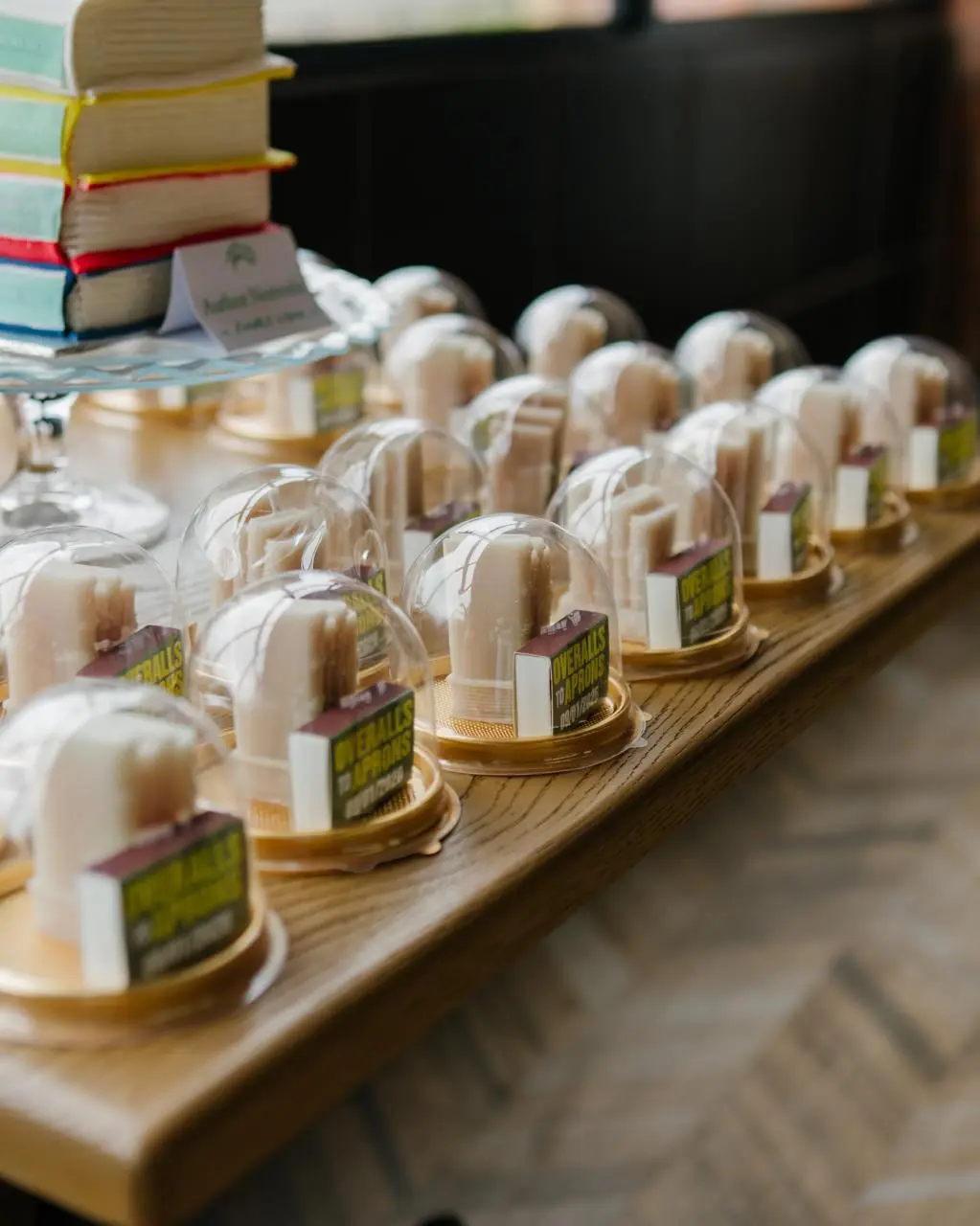 Mini gift of mini book stack candles and matches.